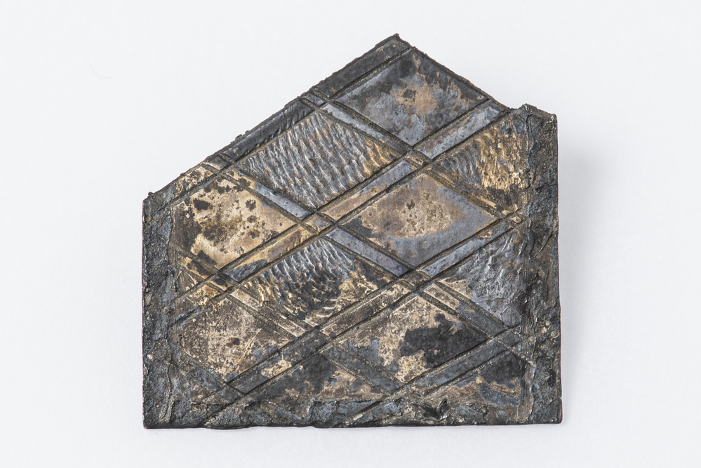 Brokstuk zilveren plaatje ruitversieringen