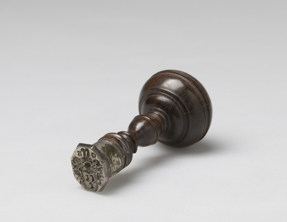 Zegelstempel/cachet met een wapen Horenken en letters G.H.