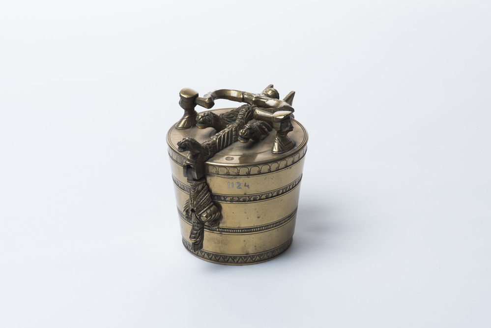 Koperen Troysch gewicht met tien ineensluitende gewichten