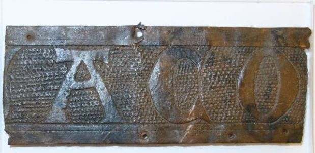 Belegselfragment van een fries met tekst U(?)ACO