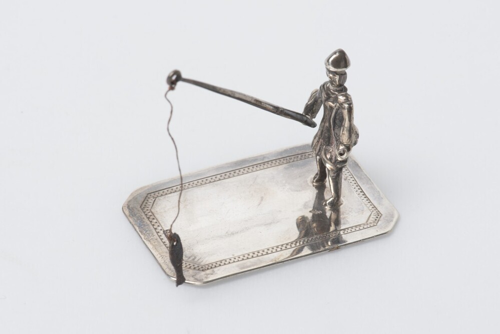 speelgoedfiguur van visser