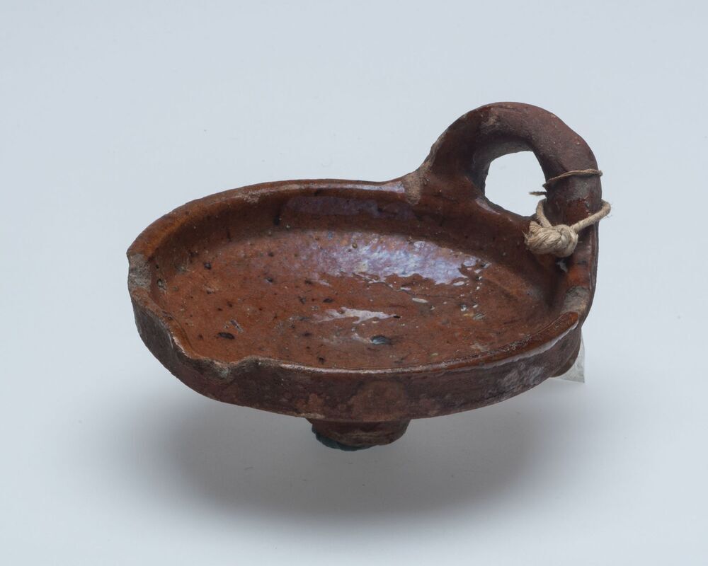 Fragment van een olielamp