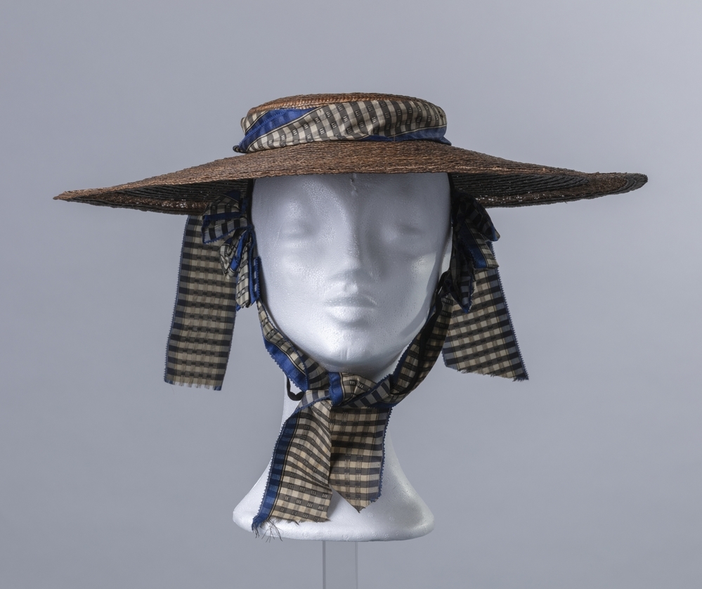 Dameshoed van bruin stro