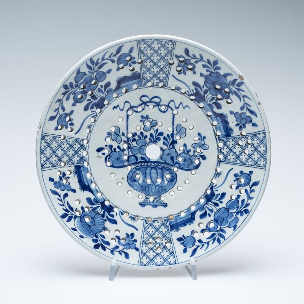 Geperforeerde plaat (van een visschotel)