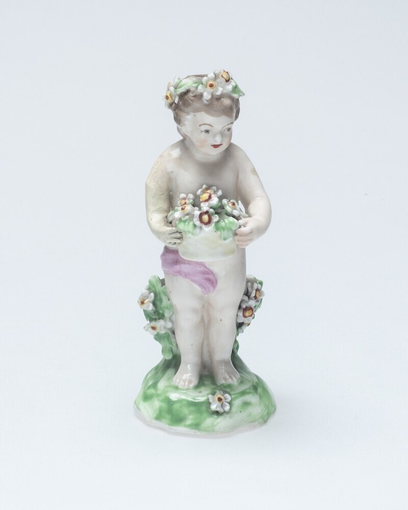 Kind met bloemenmand