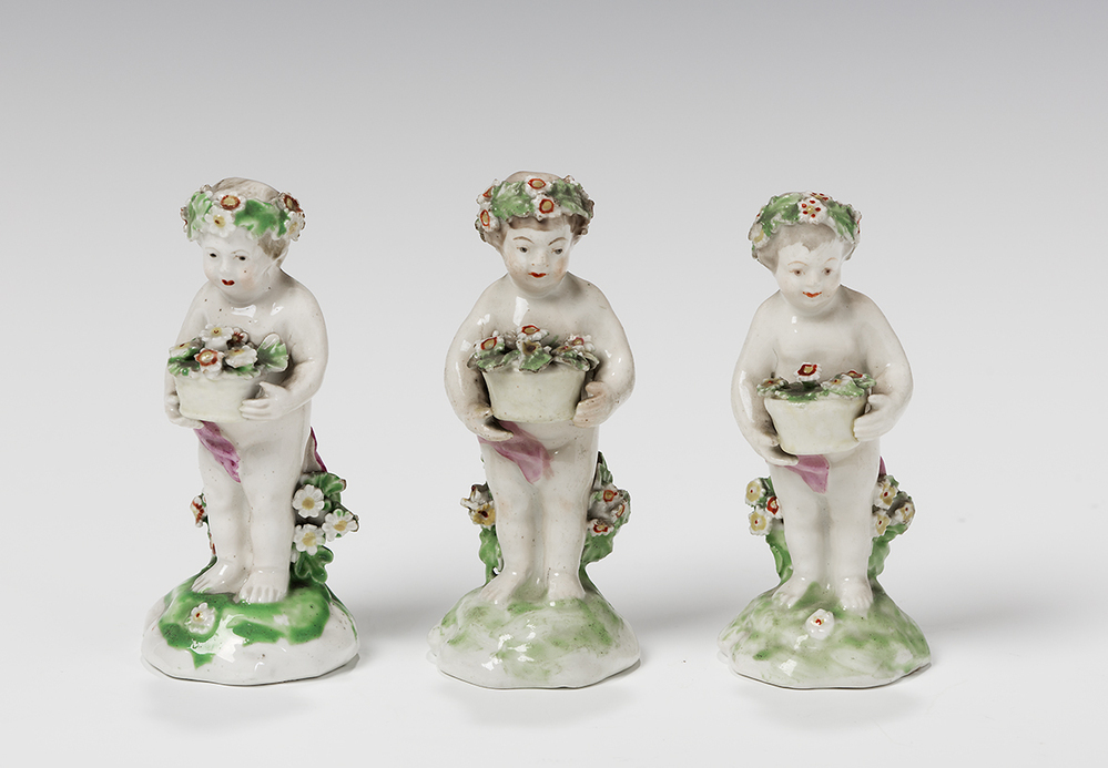 Beeldje Kind met bloemenmand