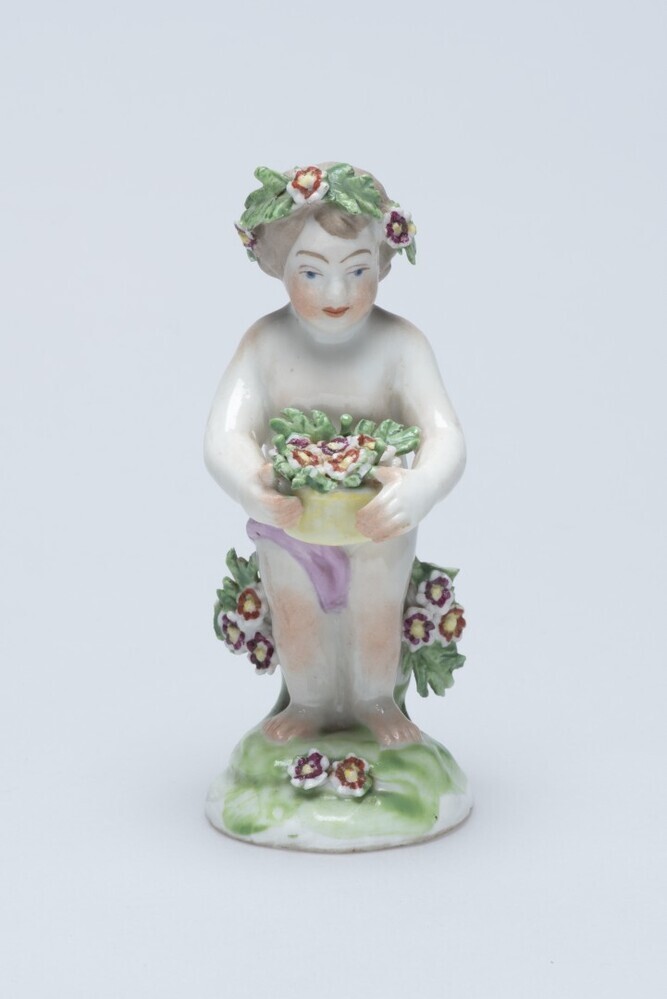 Kind met bloemenmand