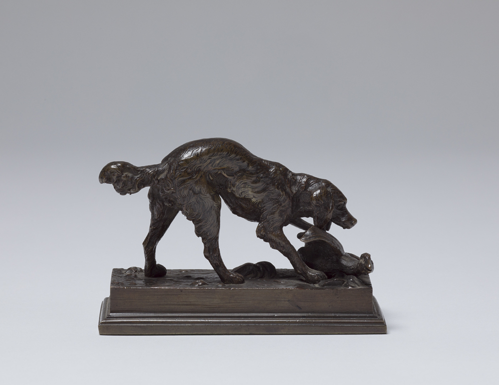 Spaniel met aangeschoten eend