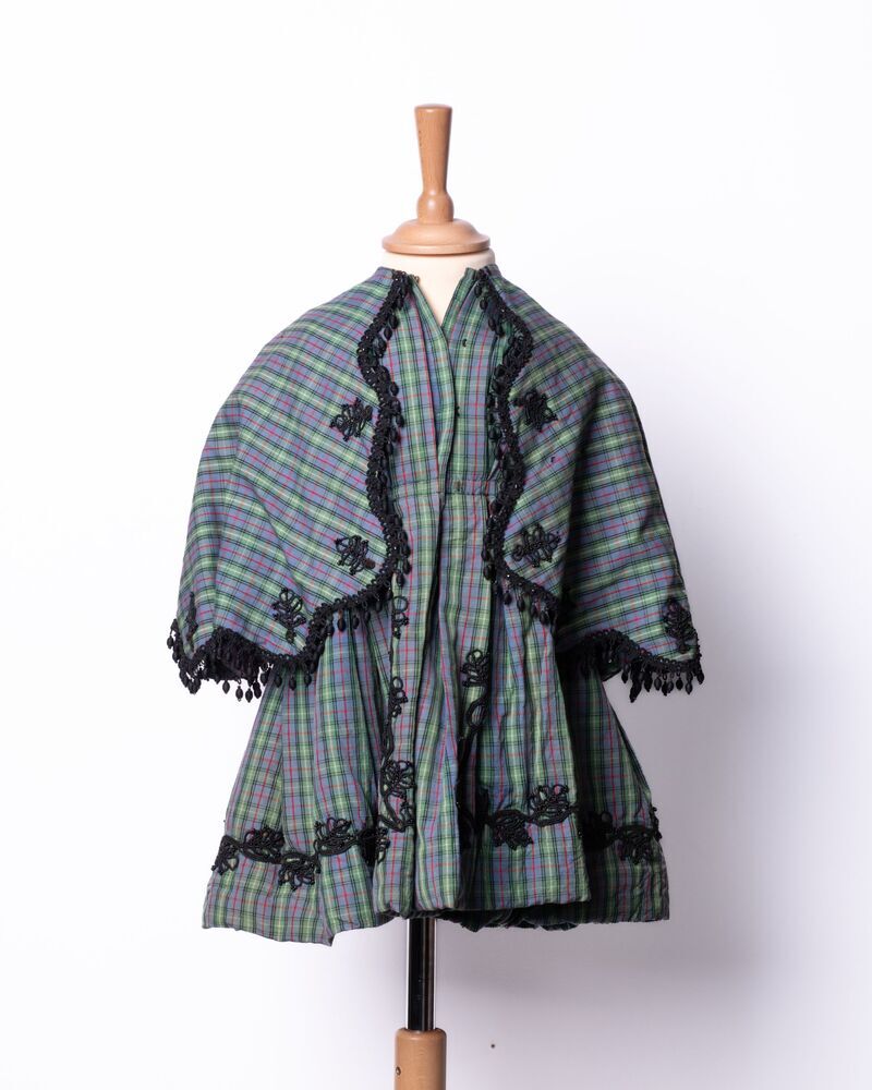 Kinderjakje met pelerine