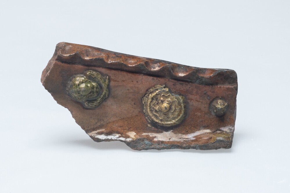 Fragment van een vuurklokomlijsting