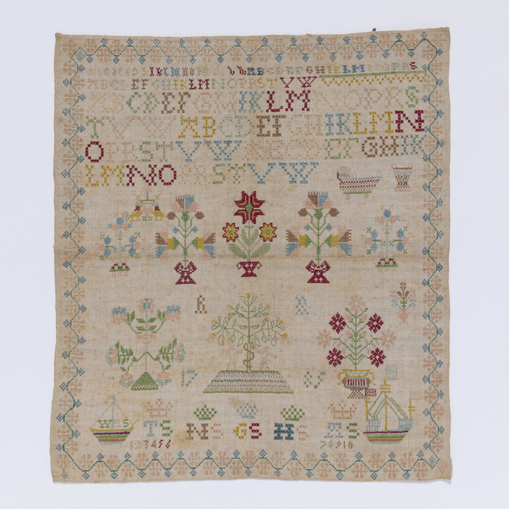 Merklap met Adam en Eva