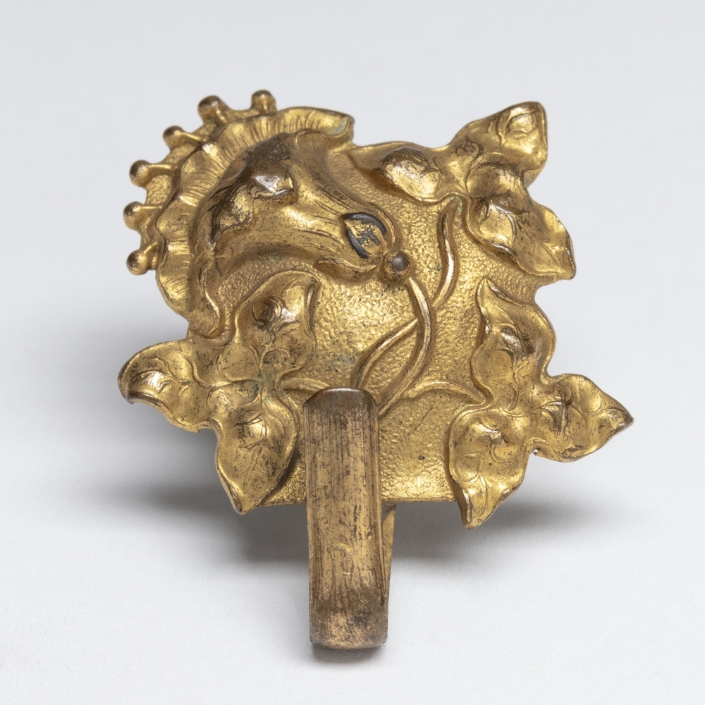 Verguld koperen sluiting van een rotonde