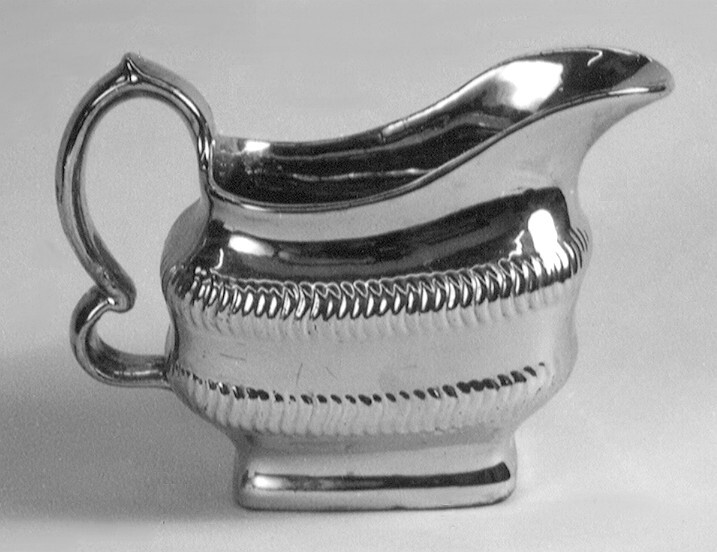 Melkkan van zilverluster