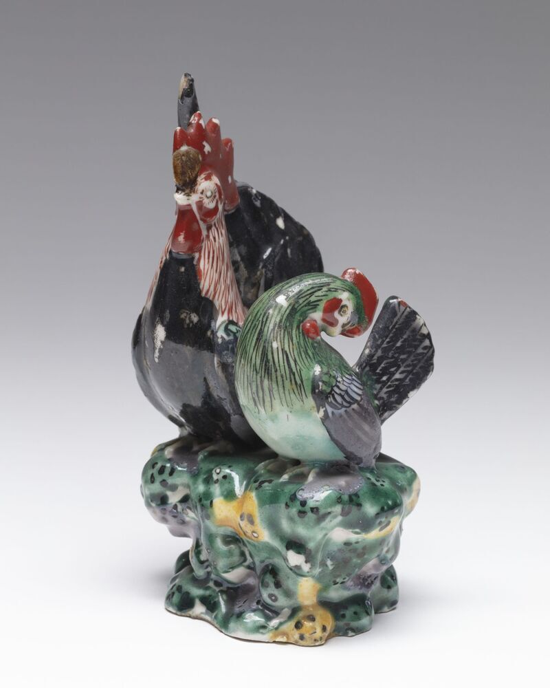 Beeldje van een haan en een hen