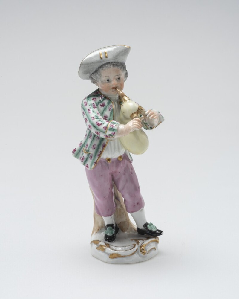 Doedelzak spelende jongen