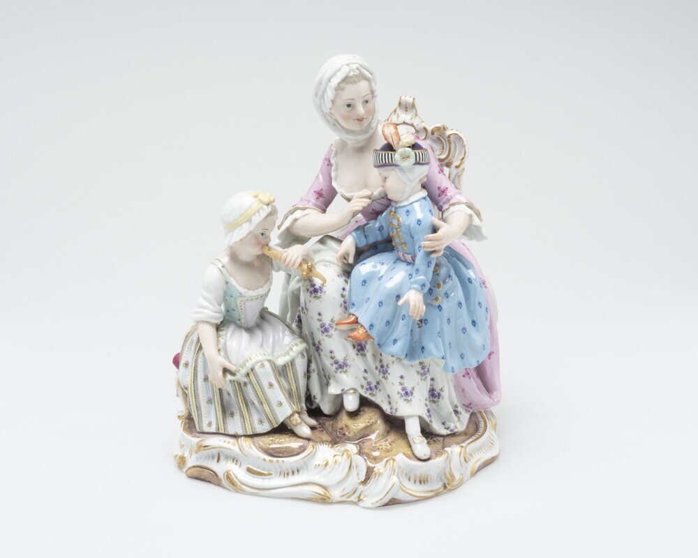 Jonge vrouw met twee kinderen