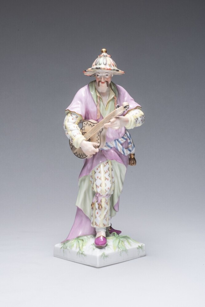 Chinese man met muziekinstrument