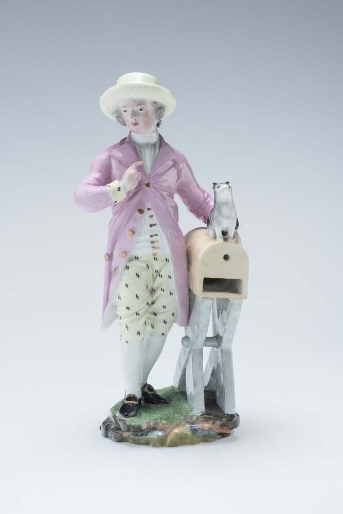 Jongeman met kleine hond