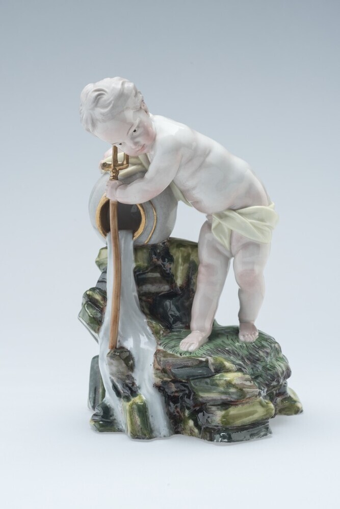 Jongen als zinnebeeld van een bron