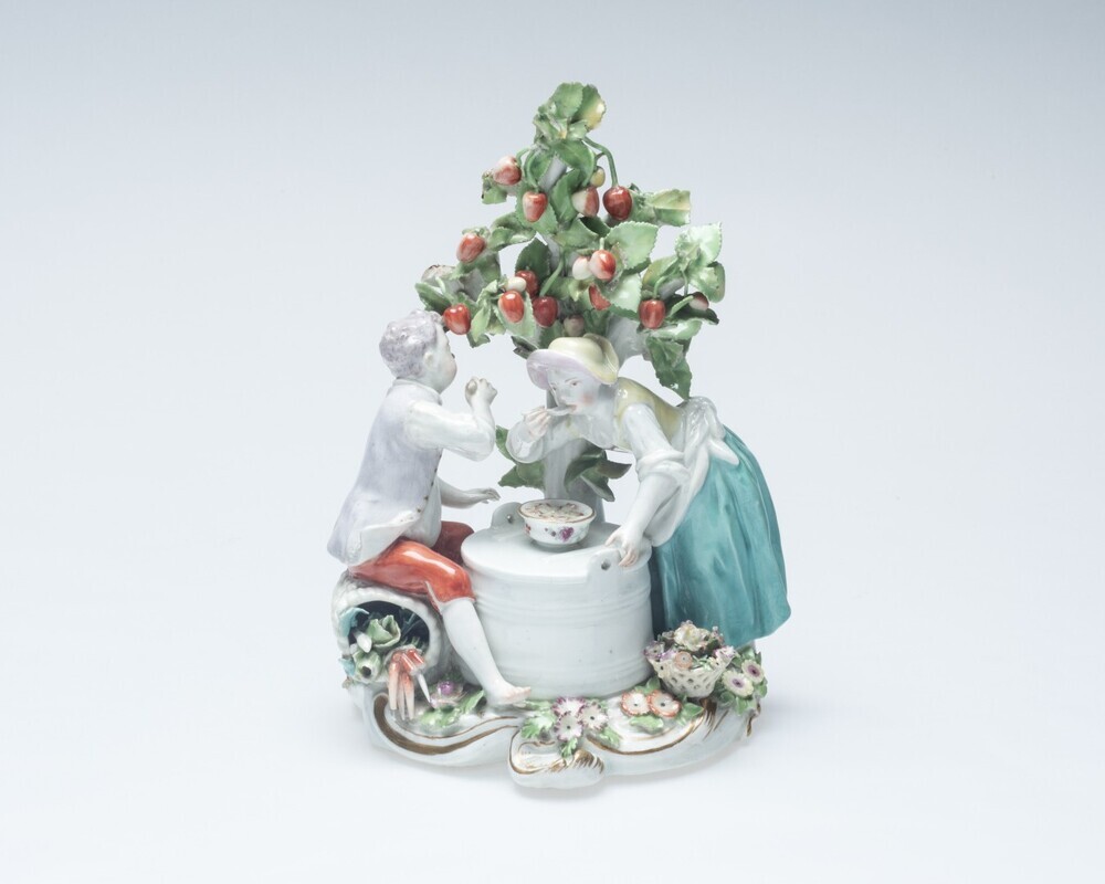 Familiegroep onder een boom