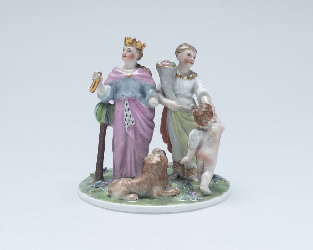 Man en vrouw bij leeuw en bij Amor