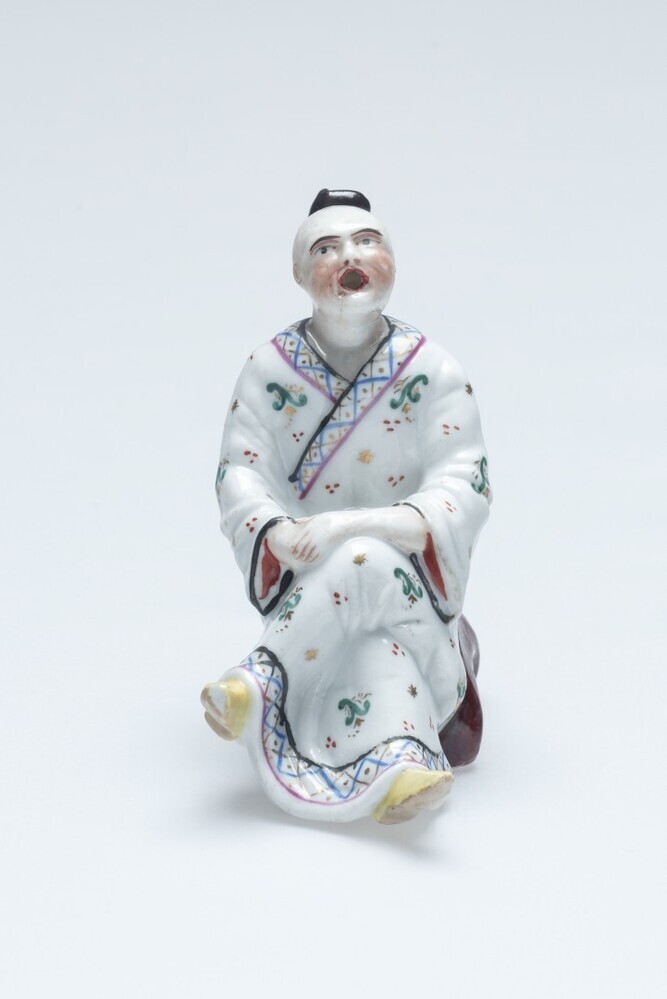 Zittende Chinese man