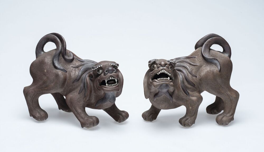 twee honden van Boeddha