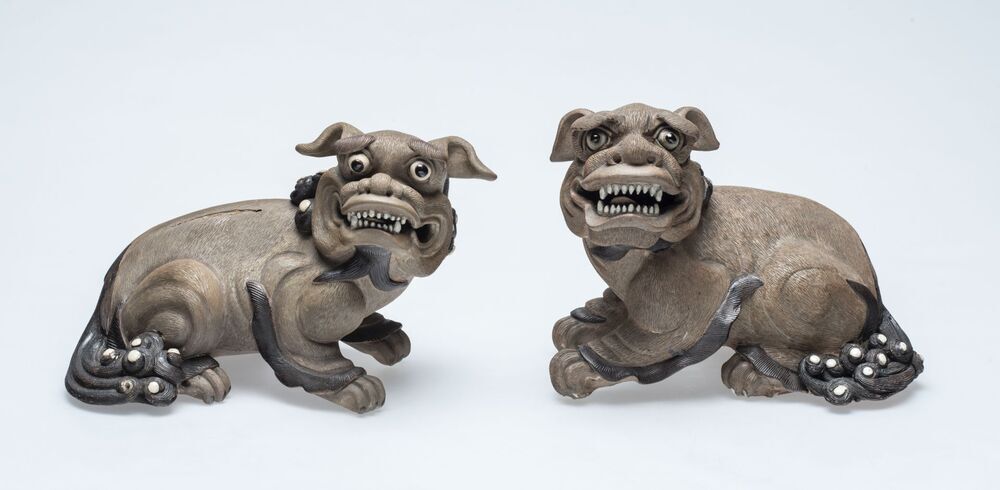 Twee honden van Boeddha