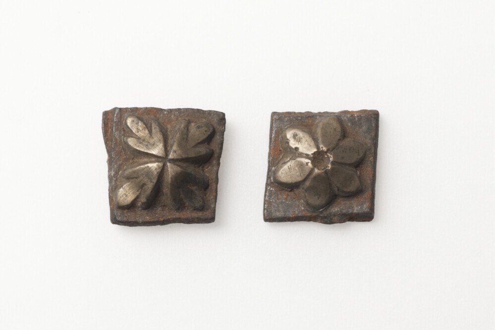 IJzeren model voor een rozet