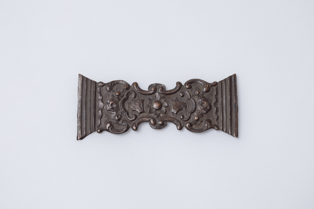 Koperen model voor een boekkrap