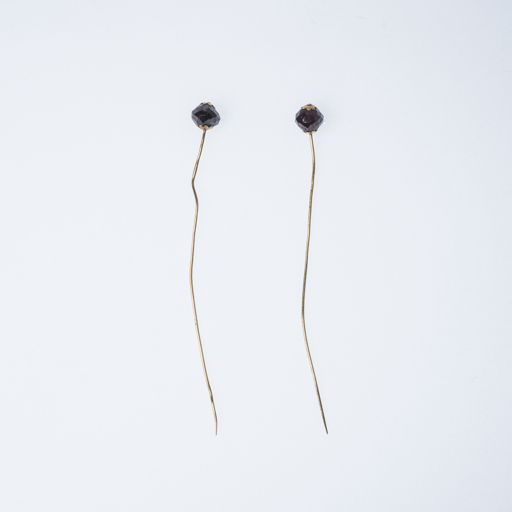 Twee gouden mutsspelden