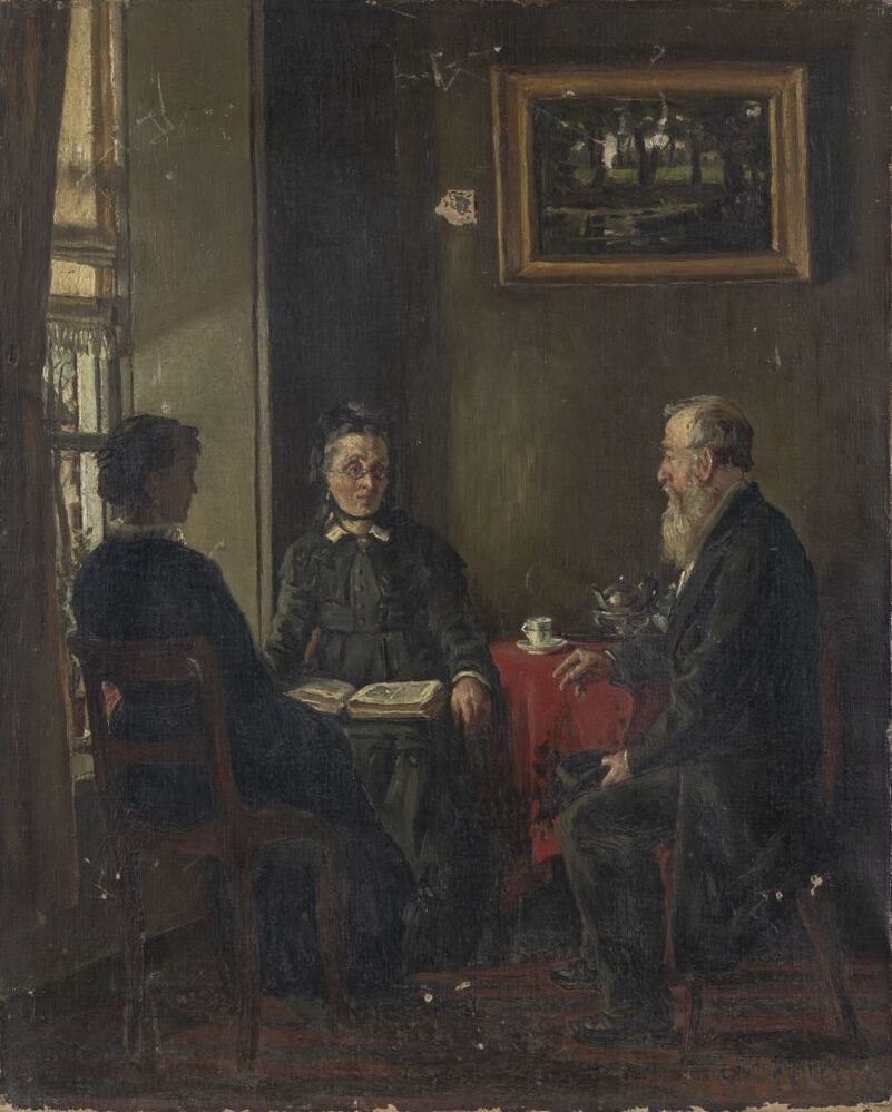 Familiegroep bij theetafel