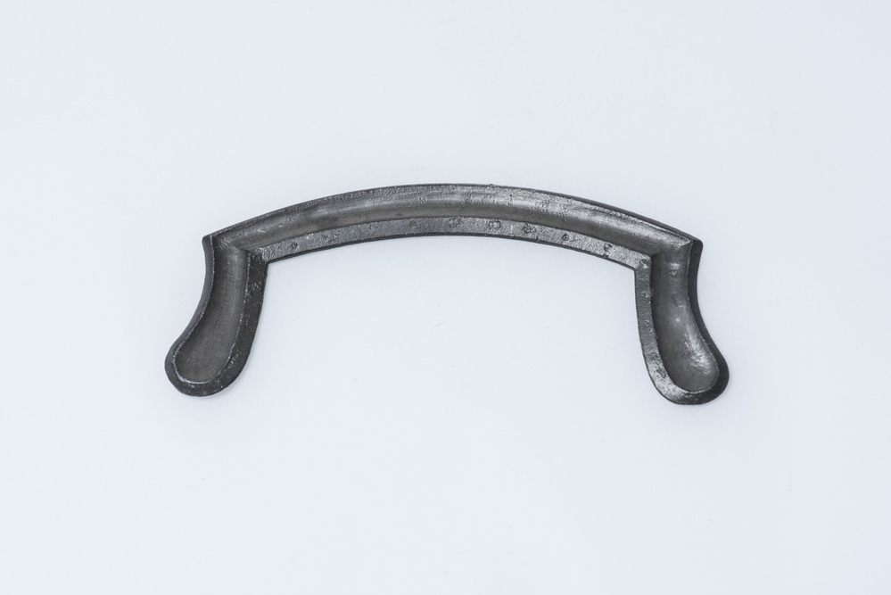 Loden model voor een tasbeugel