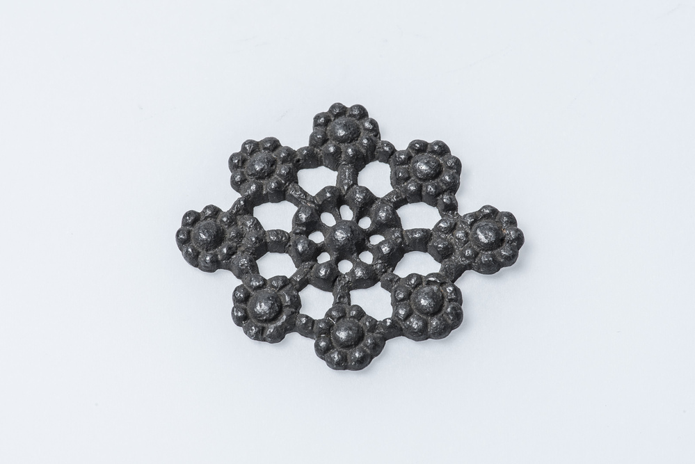 Loden model voor een ornament