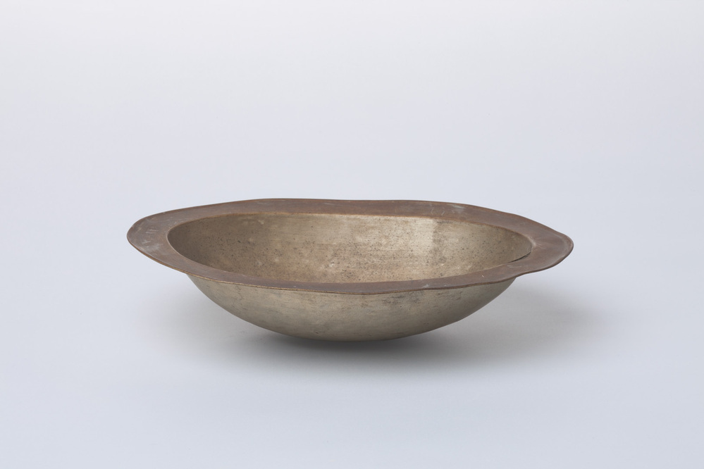 Barbiersbekken van blank metaal