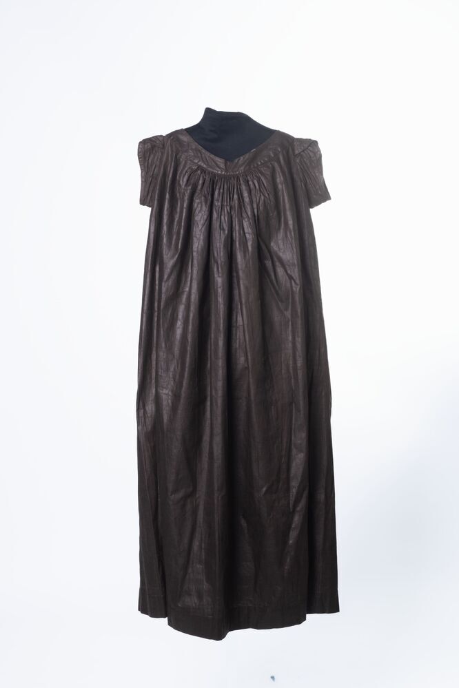 Donkerbruine japon van gekalandeerd katoen