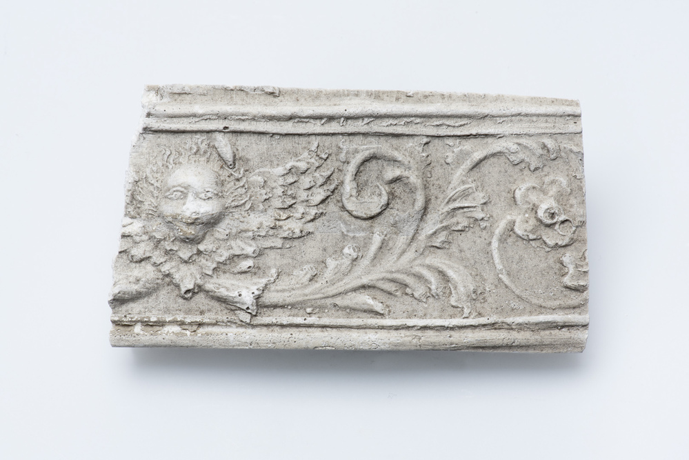 Gipsafgietsel van de klok te Losdorp