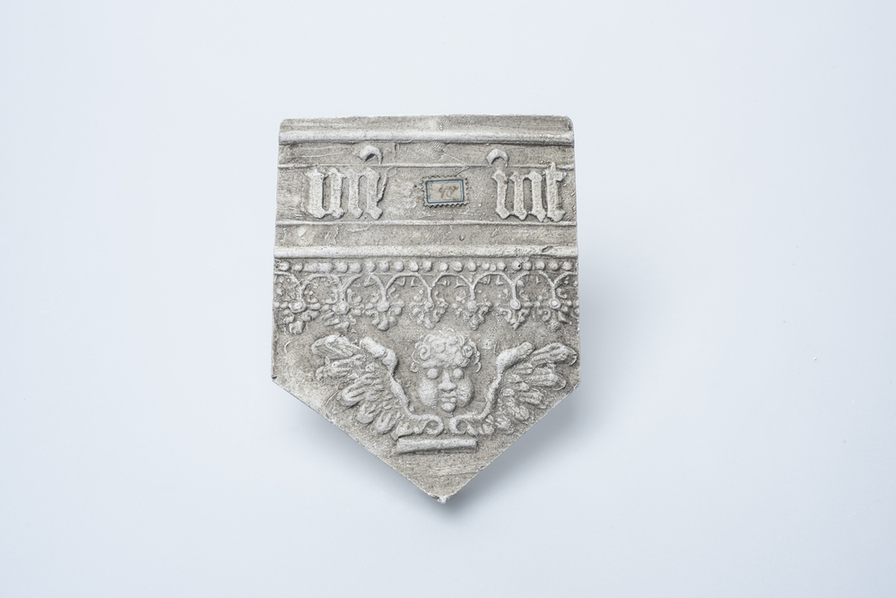 Gipsafgietsel van de klok te Losdorp