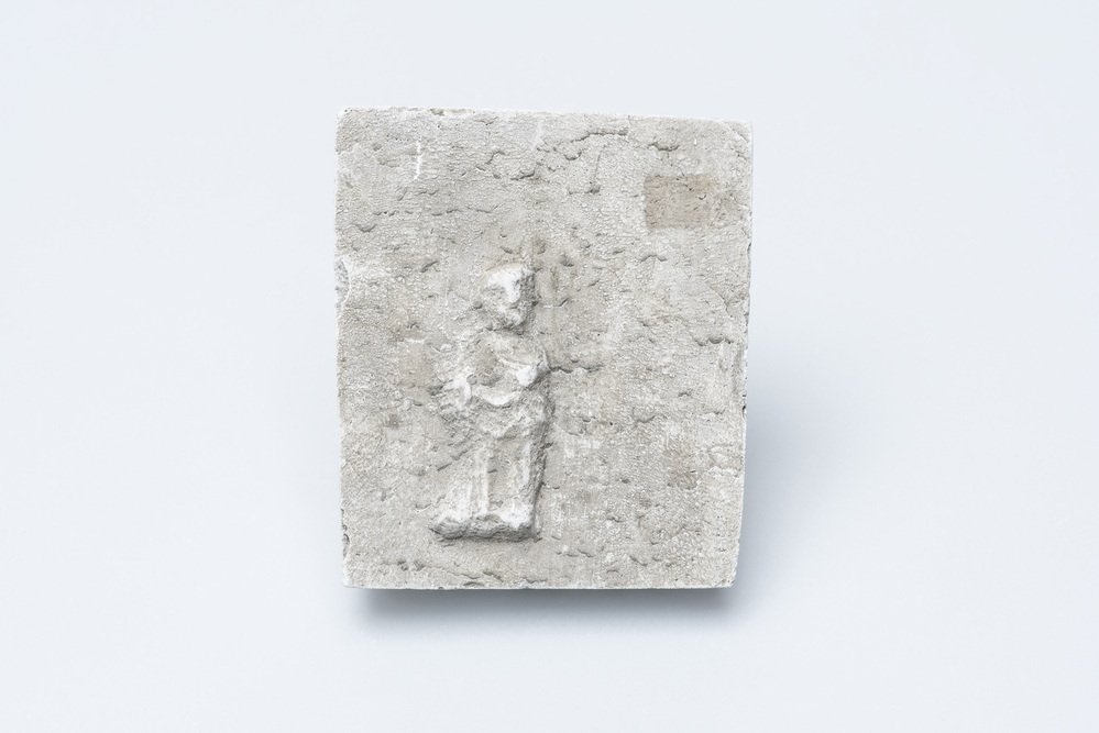 Gipsafgietsel van de klok te Hellum