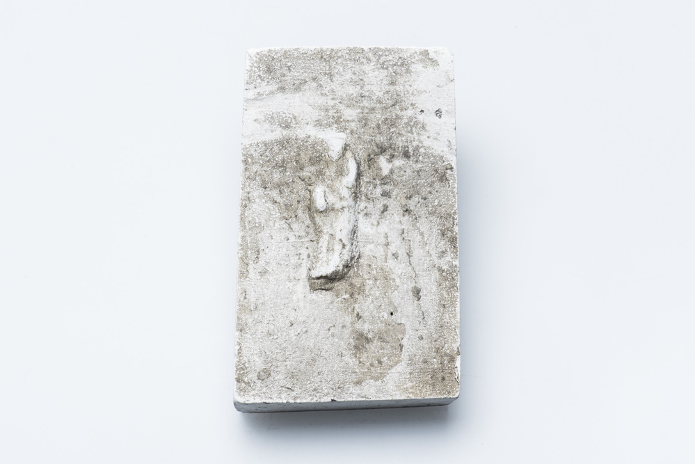 Gipsafgietsel van de klok te Hellum