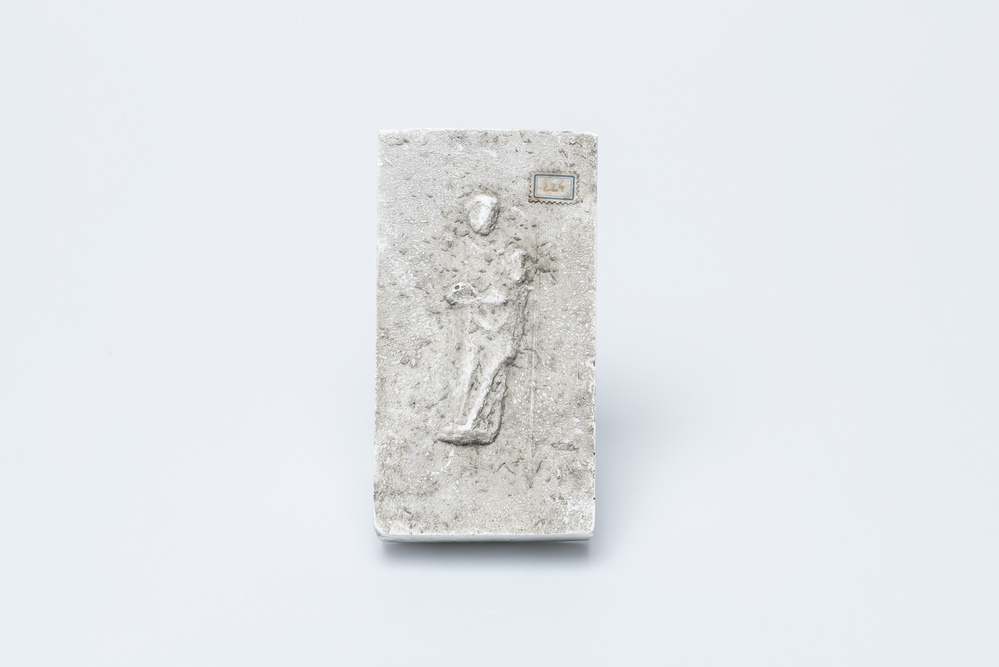 Gipsafgietsel van de klok te Hellum