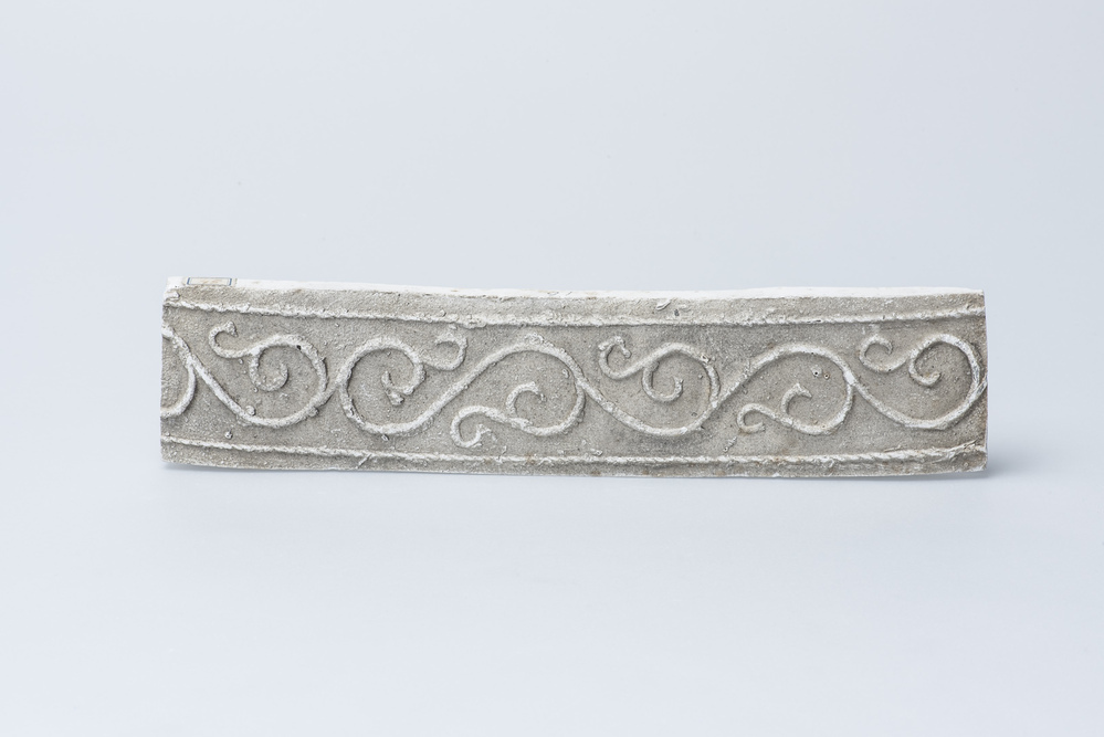 Gipsafgietsel van de klok te Uitwierda