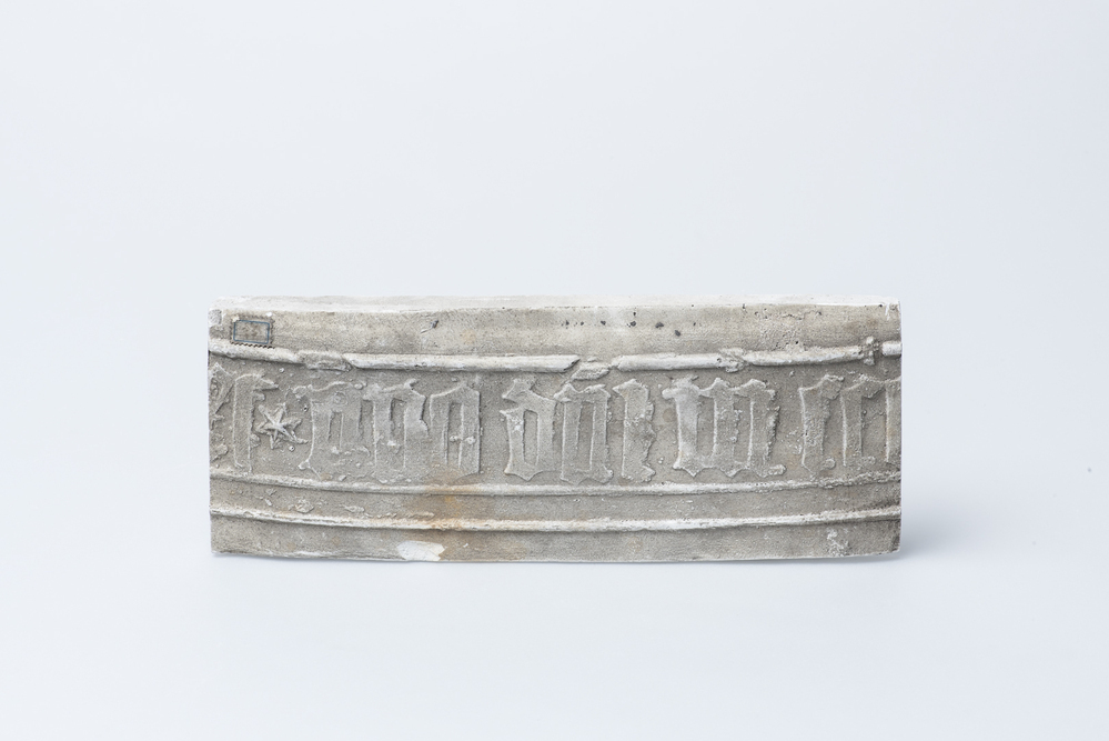 Gipsafgietsel van de klok te Godlinze