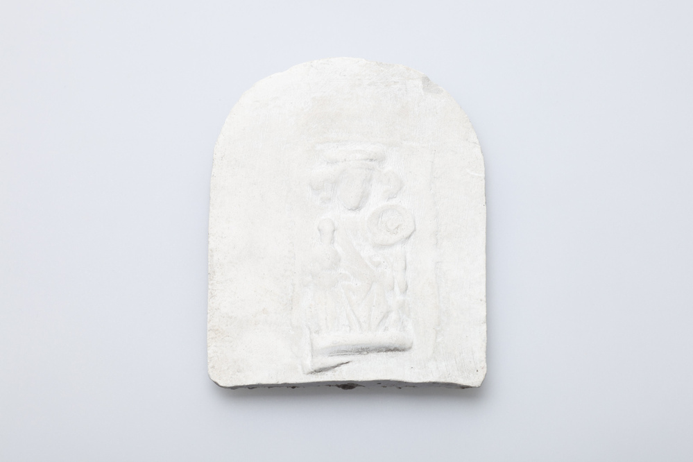 Gipsafgietsel van de klok in het Pelstergasthuis