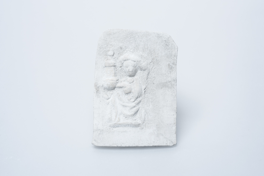 Gipsafgietsel van de klok in het Pelstergasthuis