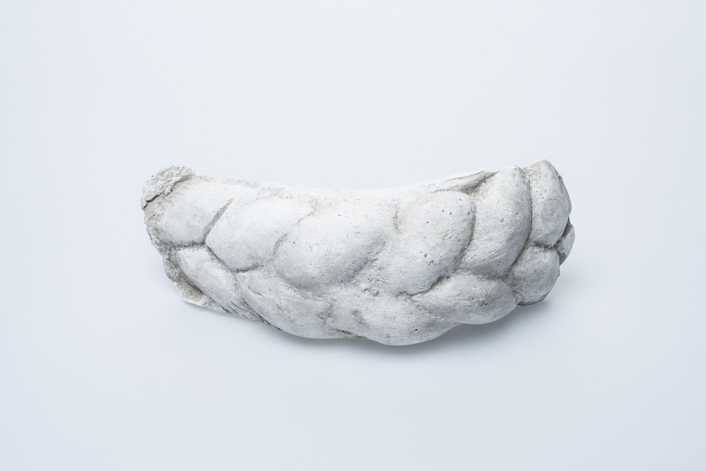 Gipsafgietsel van de klok te Hellum