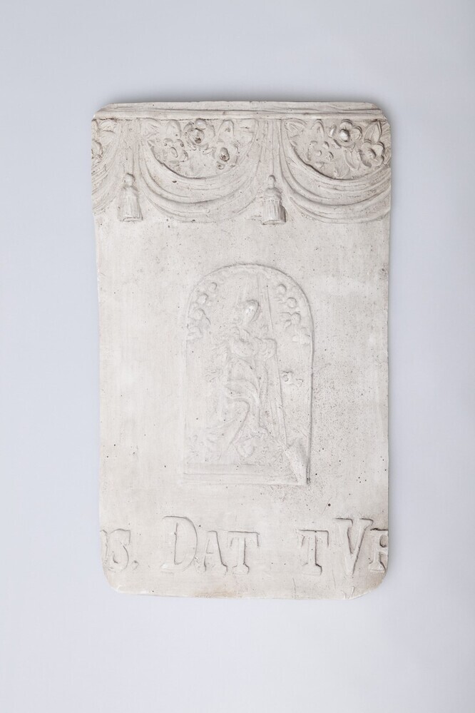 Gipsafgietsel van de klok R.K. te Bedum.