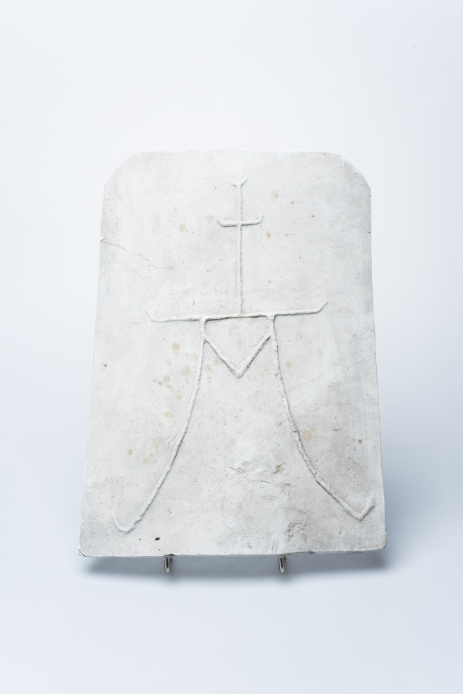 Gipsafgietsel van de klok te Hellum