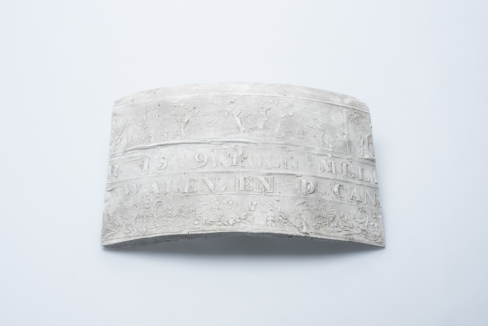 Gipsafgietsel van de klok te Obergum