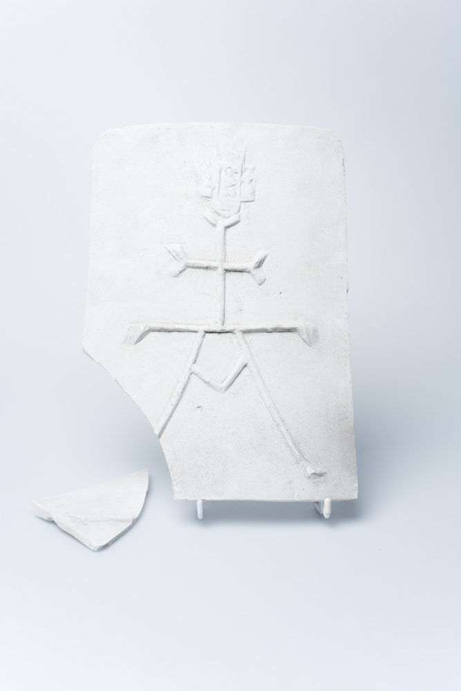 Gipsafgietsel van de klok te Eenrum